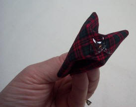 apply hot glue to the fabric square